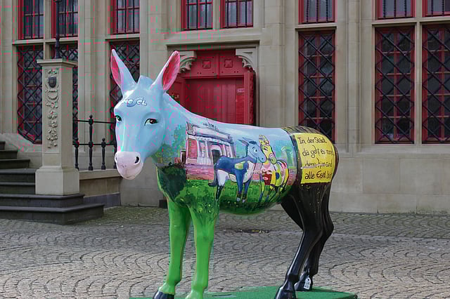 life-sized donkey sculptures on the city’s pavements