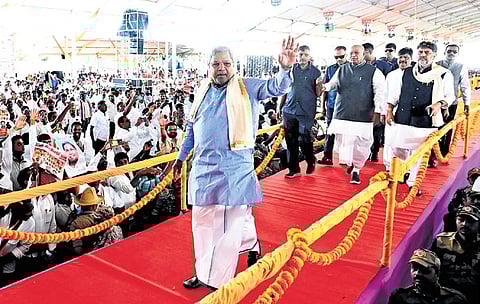 CM Siddaramaiah, AICC president Mallikarjun Kharge and Deputy CM DK Shivakumar at the Congress convention in Mysuru on Saturday.