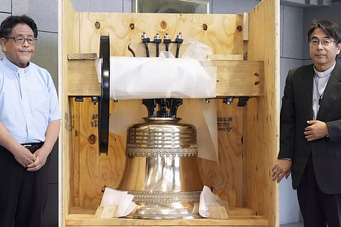 The bell, which was reproduced and returned by a group of Americans, is shown to the media at the Urakami Cathedral, nearly 80 years after the cathedral was destroyed by the U.S. atomic bombing near the end of World War