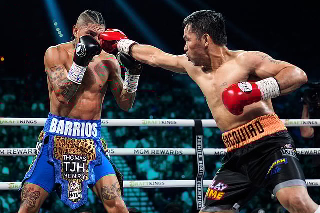Mario Barrios, left, fights Manny Pacquiao in a welterweight title boxing match Saturday, July 19, 2025, in Las Vegas. 