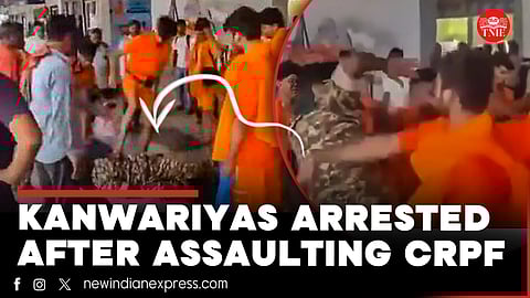 Kanwariyas return carrying Ganga water during the annual 'Kanwar Yatra.'