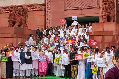 Opposition MPs stage a protest against the ongoing Special Intensive Revision (SIR) in Bihar, during the Monsoon session of Parliament, in New Delhi, Tuesday, July 22, 2025.