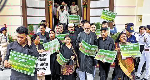 RJD legislators stage a protest against SIR in Bihar during the Monsoon session of Assembly.