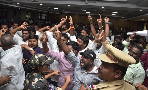 Congress and BRS workers sloganeering against each other in Siddipet Collectorate on Tuesday