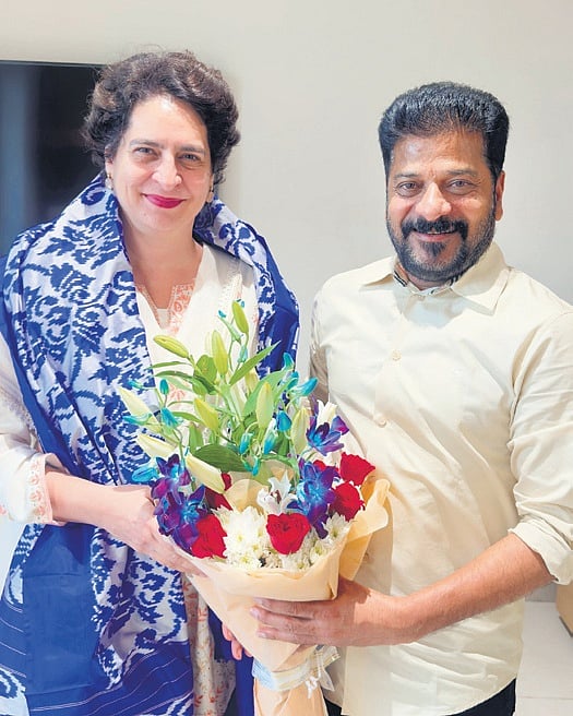 Chief Minister A Revanth Reddy greets AICC leader and Wayanad MP Priyanka Gandhi in New Delhi on Thursday