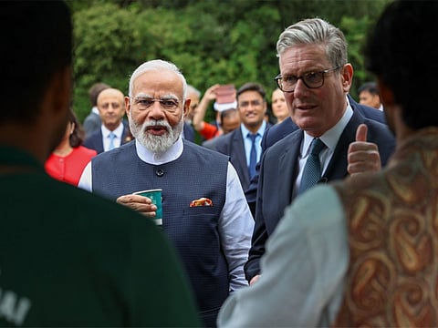 PM Modi with British counterpart Keir Starmer (Photo | ANI)
