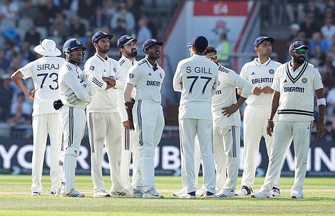 Joe Root celebrates his hundred at Old Trafford on Friday