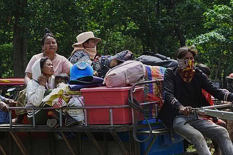 Thai soldiers inspect a border area on Sunday, July 20, 2025, in Ubon Ratchathani province, where the Royal Thai Army said two anti-personnel landmines were found.