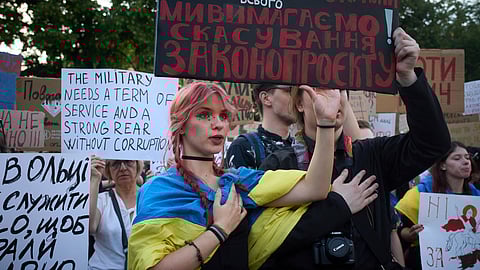Demonstrators protest against a new bill proposed by President Volodymyr Zelenskyy restoring the independence of the country’s anti-corruption agencies, in Kyiv, Ukraine, Thursday, July 24, 2025.