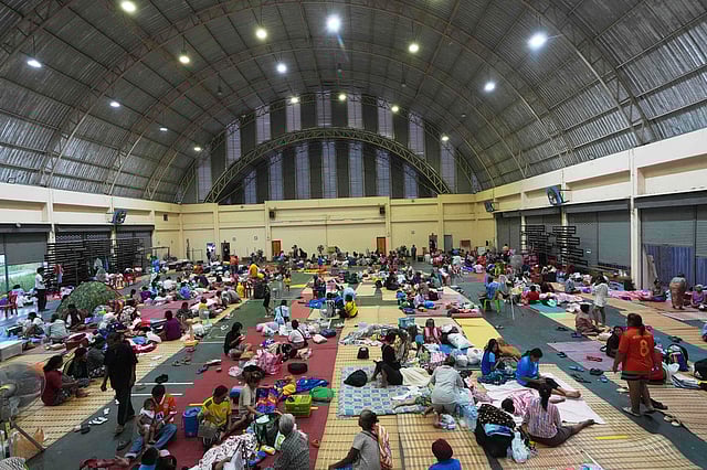 Thai residents who fled homes following clashes between Thai and Cambodian soldiers rest at an evacuation center in Surin province, Thailand, Friday, July 25, 2025.