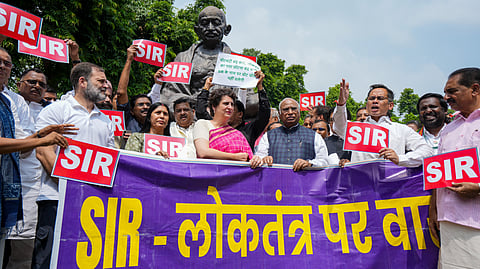 New Delhi: Leader of Opposition in Lok Sabha Rahul Gandhi, Leader of Opposition in Rajya Sabha Mallikarjun Kharge, Congress MPs Priyanka Gandhi Vadra, Gaurav Gogoi, and other MPs from the INDIA bloc parties stage a protest over the Special Intensive Revision (SIR) of Electoral Rolls in Bihar, during the Monsoon session of Parliament, in New Delhi, Friday, July 25, 2025. 