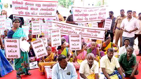 Over 50 residents from the Moolakkollai locality under Ward 24 staged a sit-in protest at the entrance of the venue, demanding pattas and basic amenities. 