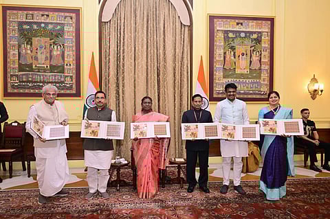 President Droupadi Murmu releases the postal stamp in New Delhi.
