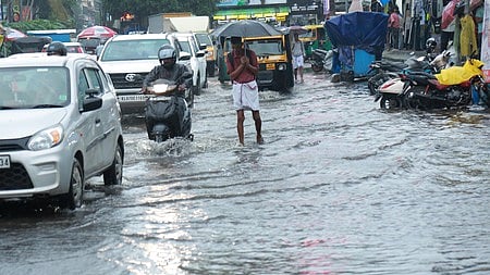 Taxi using navigation app plunges into canal along waterlogged road in Kochi