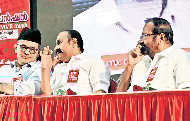 Former DCC president Palode Ravi looks on as Leader of Opposition V D Satheesan and Panakkad Sayyid Munavvarali Shihab Thangal engage in a chat at CMP’s 40th birthday convention at Tagore Theatre, T’Puram, on Saturday.