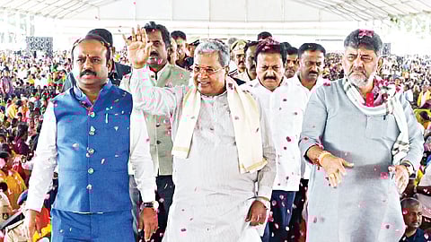 Chief Minister Siddaramaiah, DCM DK Shivakumar and other Congress leaders at the launch of various welfare works in Maddur, Mandya district, on Monday 