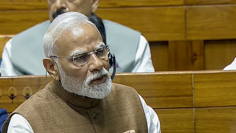 Prime Minister Narendra Modi speaks during a debate in the Lok Sabha on the Pahalgam terror attack and Operation Sindoor, at the Monsoon session of Parliament, in New Delhi, Tuesday, July 29, 2025.