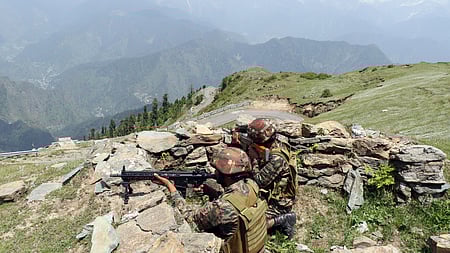  Teams of the J&K Police’s Special Operations Group (SOG) and the Army recovered a packet containing a 2-kg IED, ammunition and drugs, officials said.