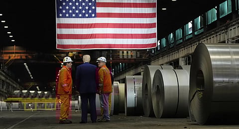 US President Donald Trump talks to workers as he tours US Steel Corporation's Mon Valley Works-Irvin plant, Friday, May 30, 2025, in West Mifflin, Pa.