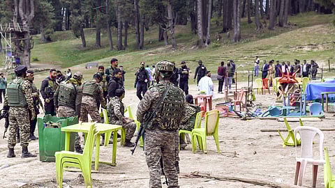 Security personnel inspect the Baisaran Valley site in Pahalgam following the terrorist attack that took place on April 22.