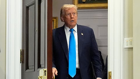 US President Donald Trump enters the Roosevelt Room at the White House on Wednesday, July 30, 2025, in Washington.