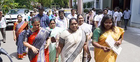 Deputy Mayor Divya and others staging a walkout from the council meet on Thursday