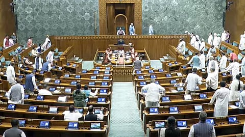 Opposition members protest, demanding a discussion on the SIR exercise in Bihar, in the Lok Sabha, Friday, Aug 1, 2025.