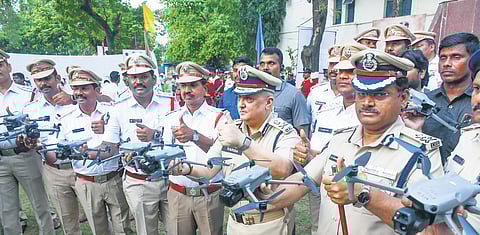DGP Harish Kumar Gupta, NTR CP SV Rajashekar Babu and other police officers 
with drones in Vijayawada on Wednesday.