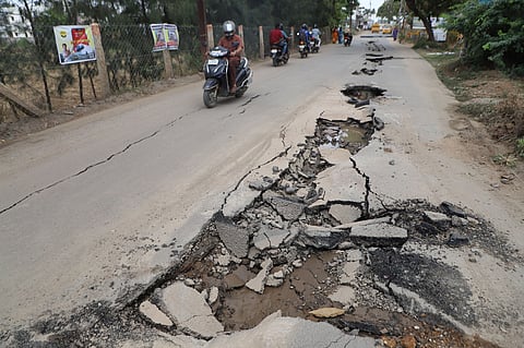 The road, damaged during underground drainage (UGD) works.