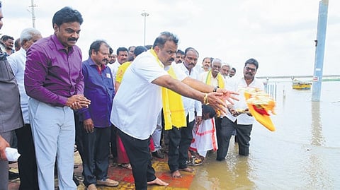 Revenue Minister Anagani Satyaprasad along with Bapatla district collector offered prayers to River Krishna and inaugurated Velaturu Aqueduct in Bhattiprolu mandal on Friday.