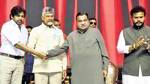 Deputy Chief Minister Pawan Kalyan greets Union Minister Nitin Gadkari at the foundation stone laying ceremony of new roads in Mangalagiri on Saturday.