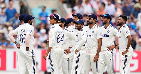 India players wait for the third umpire's decision on a successful DRS review for the wicket of England's Ollie Pope on Day 4