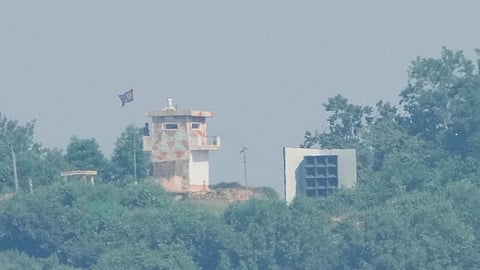 FILE - A North Korean military guard post, left, and loudspeaker are seen from Paju, South Korea, near the border with North Korea, June 12, 2025.