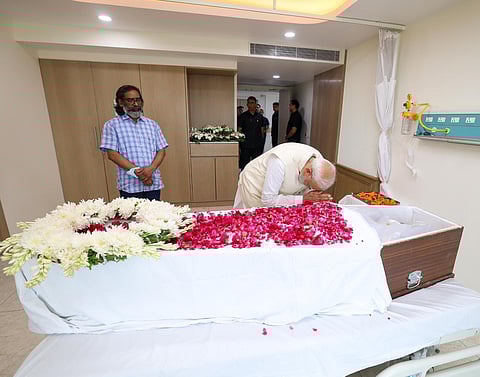 Prime Minister Narendra Modi pays respects to Shibu Soren in New Delhi on Monday.