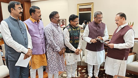 Mahaling presents the request letter to Union Health minister JP Nadda.