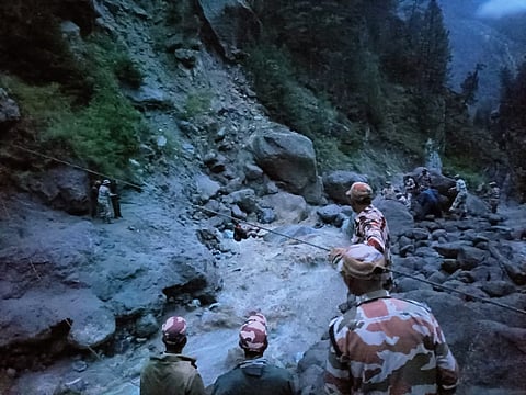 The rescue team assisting stranded pilgrims during the nine-hour overnight operation following the flash flood that hit the Kinnaur Kailash Yatra route in Himachal Pradesh on Aug 5, 2025.
