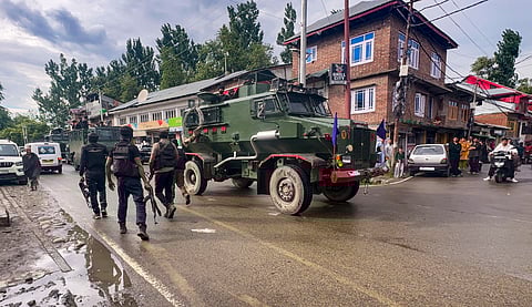 Security personnel during the anti-terrorist operation, in Jammu and Kashmir's Kulgam district.