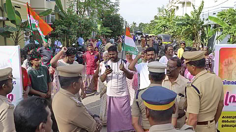 A group of fishermen, led by the Youth Congress, are protesting during the inauguration ceremony of flats built for fishermen's families under the Punargeham project A at Muttathara in Thiruvananthapuram on Thursday, alleging irregularities in the distribution of flats.