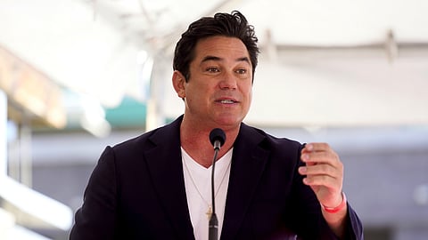 FILE - Dean Cain speaks during a ceremony honoring Mehmet Oz with a star on the Hollywood Walk of Fame in Los Angeles on Feb. 11, 2022
