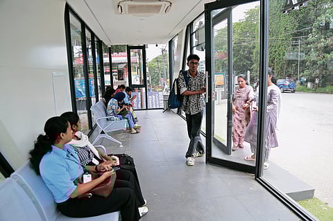 City gets another ‘cool’ bus shelter, 
while the first one offers cold comfort