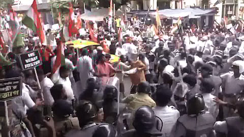 Protesters clash with police at Park Street crossing in Kolkata during a march demanding justice for the RG Kar hospital doctor, one year after her brutal rape and murder.