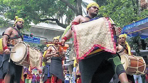 Folk artistes perform near Ragigudda Metro Station ahead of PM Narendra Modi inaugurating the Yellow Line of Namma Metro in Bengaluru on Sunday 