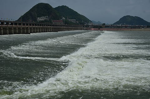 As much as 90000 cusecs of surplus water being released downstream of Prakasam Barrage in Vijayawada after receiving inflow from the upper catchment area. 