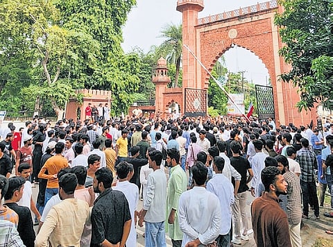 Students protest over steep fee hike at the AMU campus.