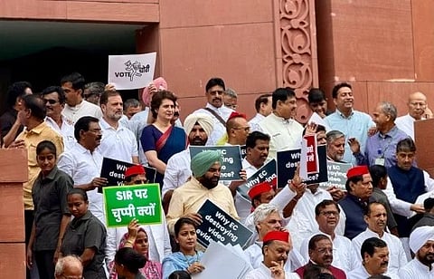 Wearing white caps with a red cross on the words 'SIR' and "vote chori", the protesting MPs raised slogans against the Special Intensive Revision (SIR) exercise in Bihar while carrying placards and banners.