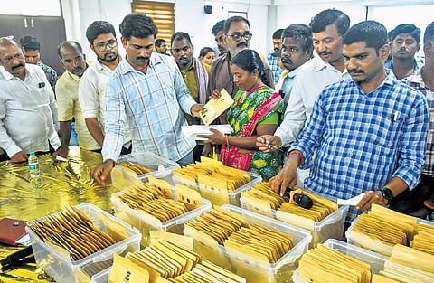 People seen collecting lost mobiles, by furnishing IMEI number and service provider details, from the NTR district police in Vijayawada on Tuesday 