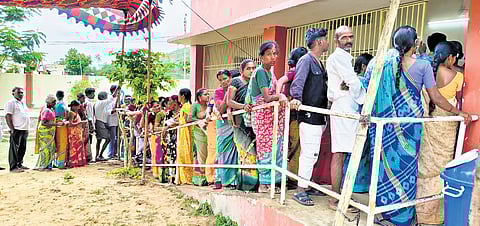  people stand in queue to cast their votes during Vontimitta ZPTC elections 