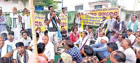 Farmers staging protest at Bargarh collectorate on Tuesday 