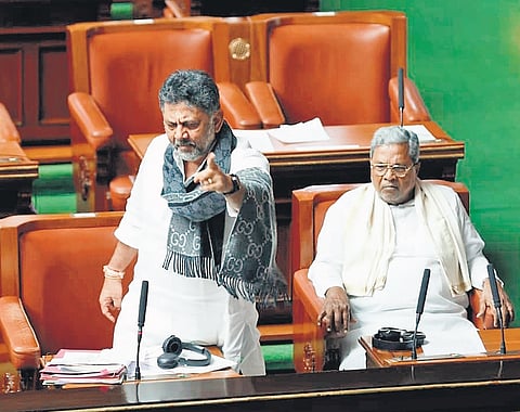Dy CM D K Shivakumar slams BJP MLAs as Chief Minister Siddaramaiah watches, at Vidhana Soudha on Wednesday.