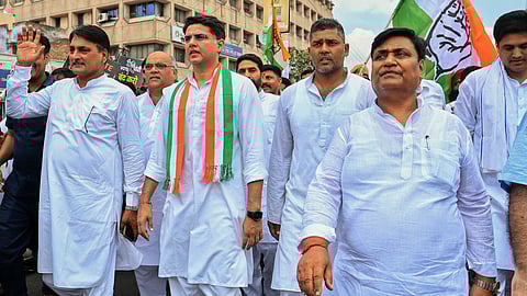 Rajasthan Congress President Govind Singh Dotasra, party leader Sachin Pilot and others take part in a protest march over alleged irregularities in voter lists, in Jaipur.